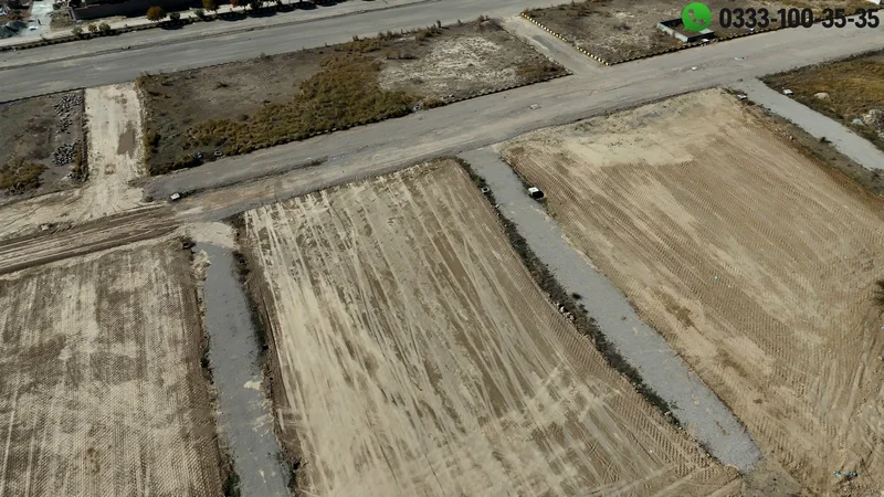 
Sector F in university town is now taking shape still unfinished streets.